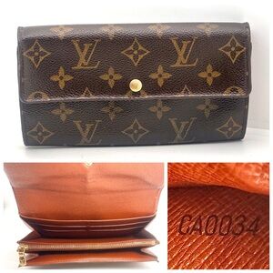 Good condition authentic Louis Vuitton Monogram Sarah wallet CA0034